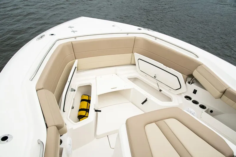 Slide: The Image of Interior view of 2022 Sailfish 360 CC boat with beige seating. - 15