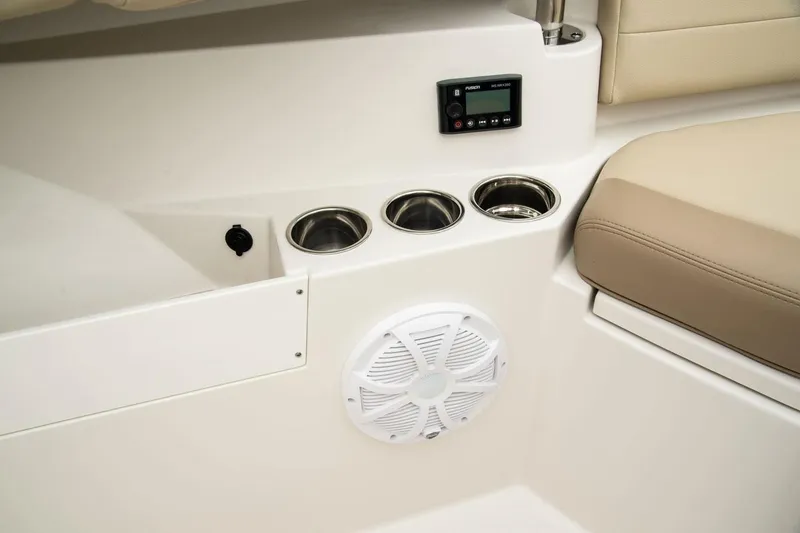 Slide: The Image of Interior of Sailfish 360 CC 2022 with speaker and cup holders. - 16