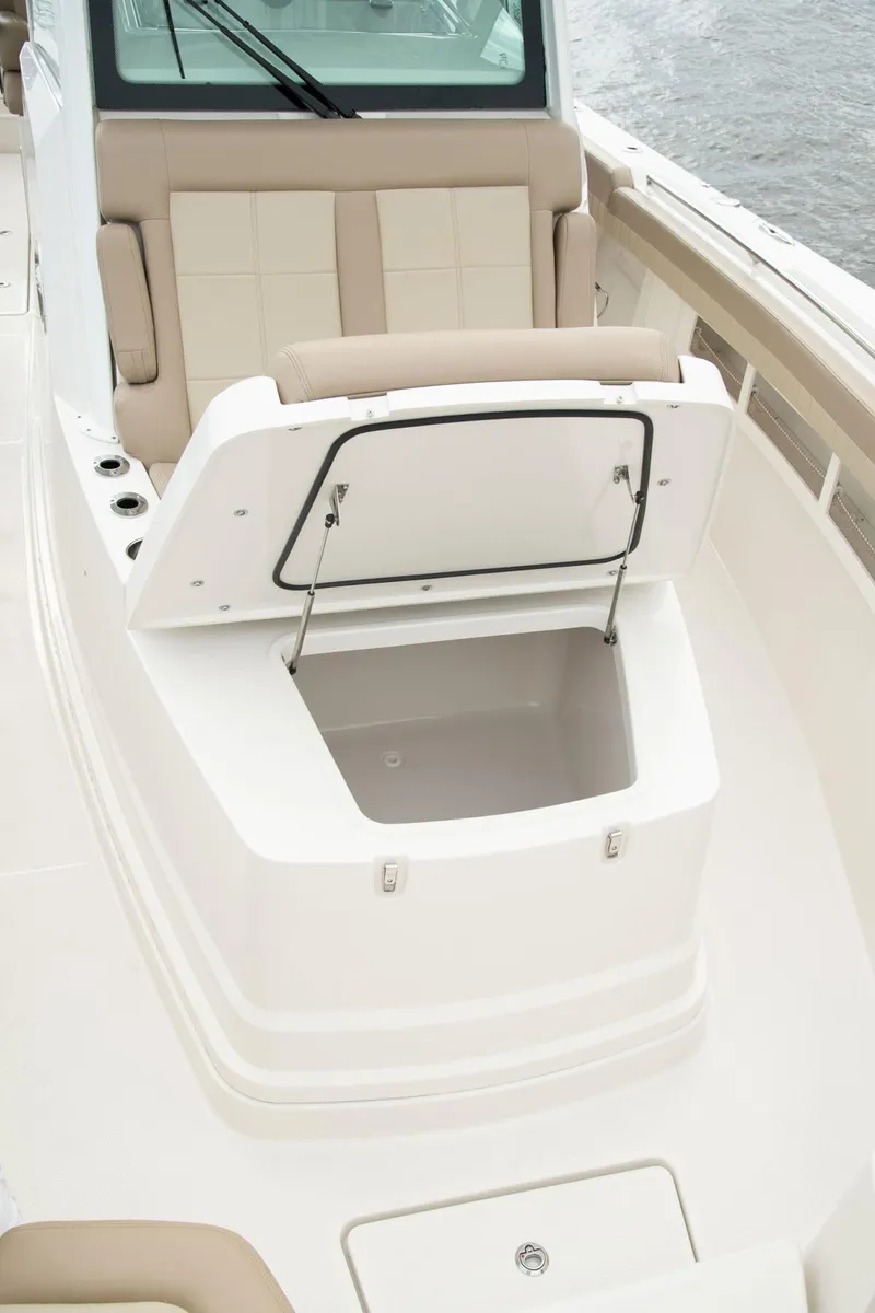 Slide: The Image of Sailfish 360 CC 2022 with open storage compartment on the boat. - 20