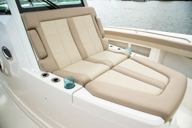 Slide: The Image of Luxurious seating on a 2022 Sailfish 360 CC boat. - 21