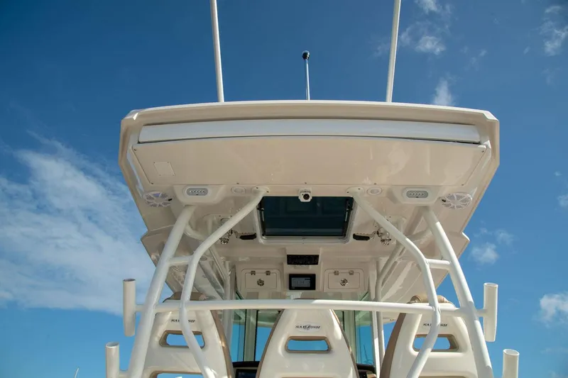 Slide: The Image of Sailfish 360 CC 2022 boat roof under blue sky. - 24