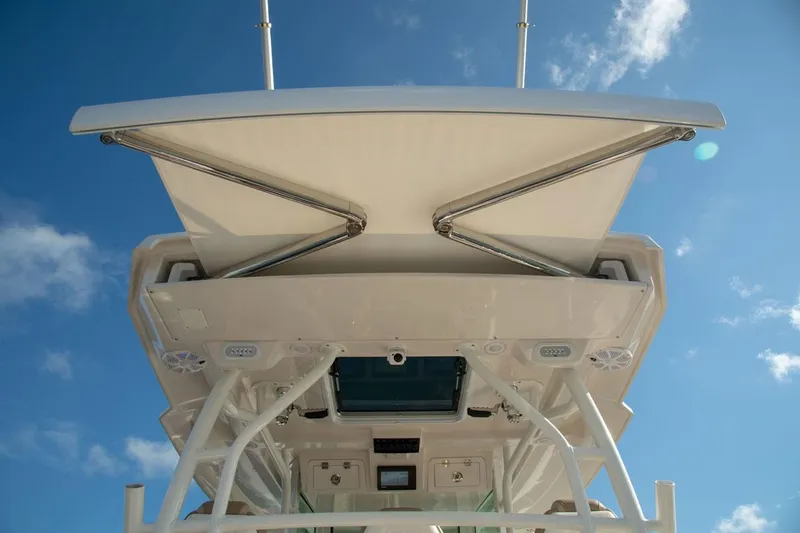 Slide: The Image of Sailfish 360 CC 2022 boat roof against blue sky. - 25