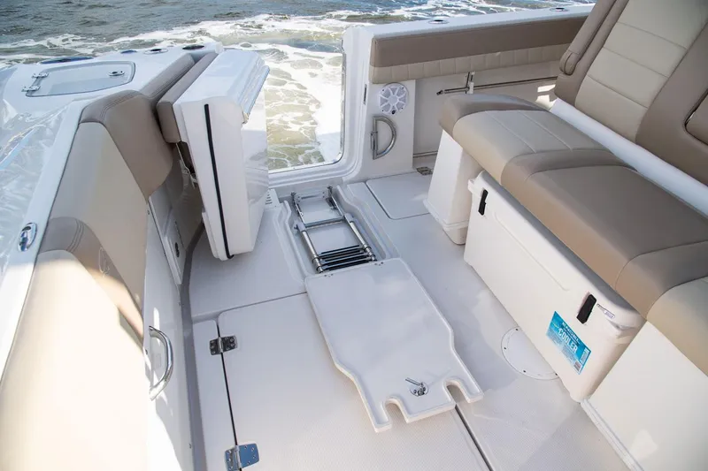 Slide: The Image of Interior of 2022 Sailfish 360 CC with seating and storage area. - 28
