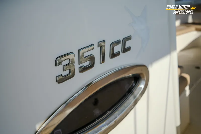 Slide: The Image of Close-up of 2018 Key West Billistic 351 Center Console boat emblem. - 110