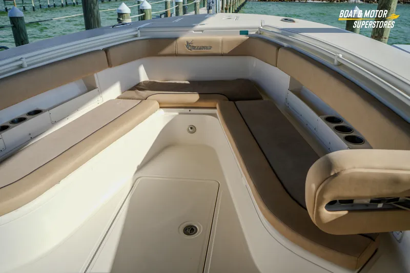 Slide: The Image of 2018 Key West Billistic 351 Center Console boat interior with cushioned seating. - 113