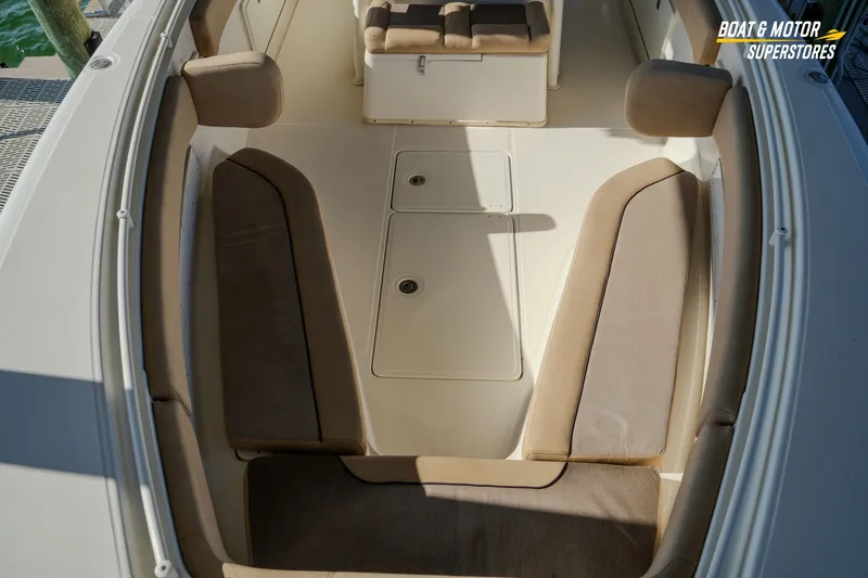 Slide: The Image of 2018 Key West Billistic 351 Center Console boat interior with cushioned seating. - 117