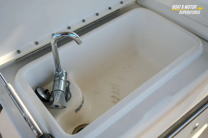 Slide: The Image of 2018 Key West Billistic 351 Center Console sink with chrome faucet. - 132