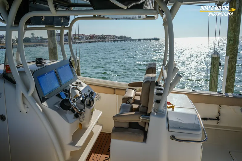 Slide: The Image of 2018 Key West Billistic 351 Center Console boat interior with ocean view. - 169