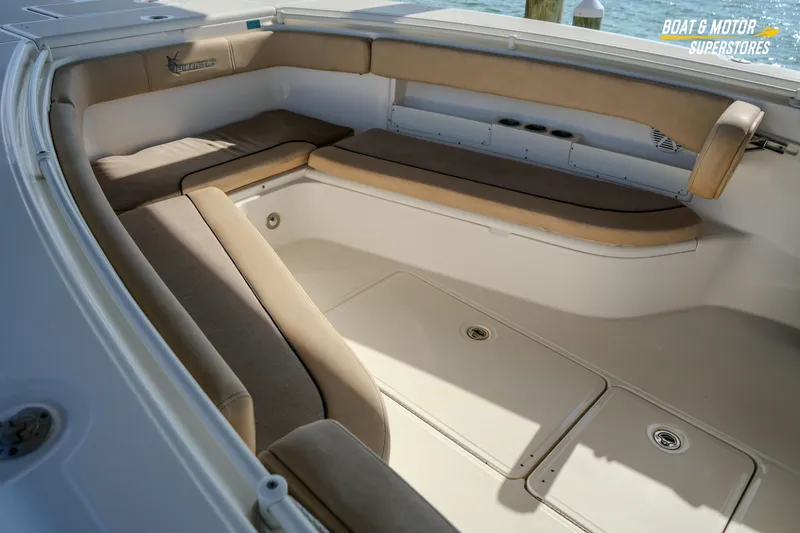 Slide: The Image of 2018 Key West Billistic 351 Center Console boat interior with cushioned seating. - 36