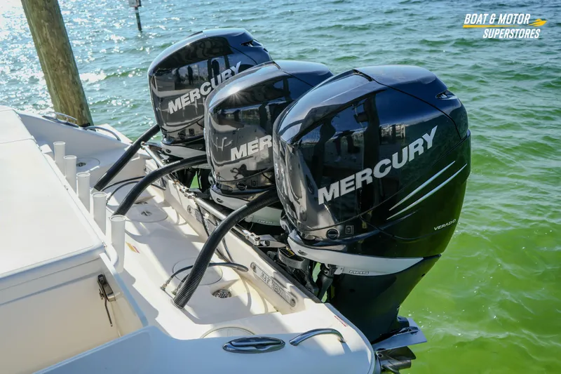 Slide: The Image of 2018 Key West Billistic 351 Center Console with triple Mercury outboard engines. - 38