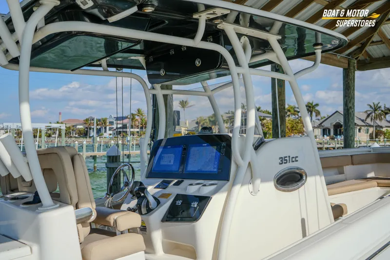 Slide: The Image of 2018 Key West Billistic 351 Center Console boat docked at marina. - 46