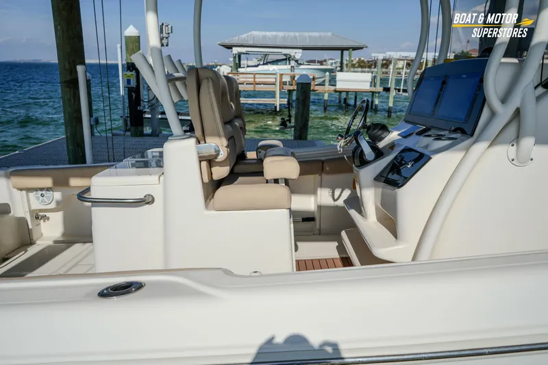 Slide: The Image of 2018 Key West Billistic 351 Center Console boat interior with helm and seating. - 55