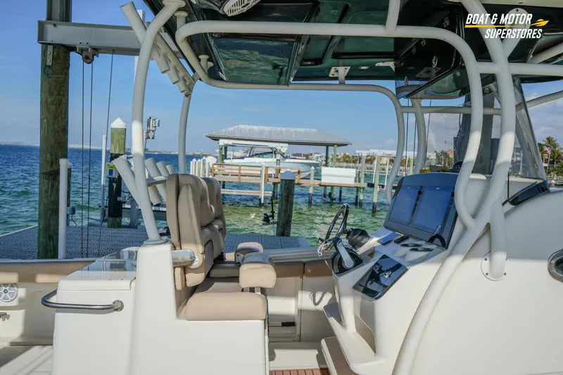 Slide: The Image of 2018 Key West Billistic 351 Center Console boat interior with ocean view. - 56
