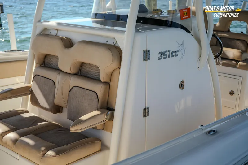 Slide: The Image of 2018 Key West Billistic 351 Center Console boat interior with cushioned seating. - 71