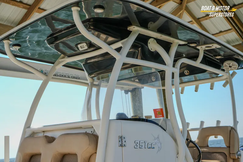 Slide: The Image of 2018 Key West Billistic 351 Center Console boat interior with seating and console details. - 74