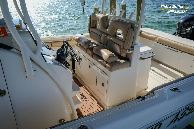 Slide: The Image of 2018 Key West Billistic 351 Center Console boat interior with helm and seating. - 79