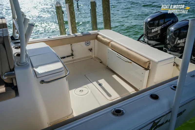 Slide: The Image of 2018 Key West Billistic 351 Center Console boat interior with seating and Mercury engines. - 82