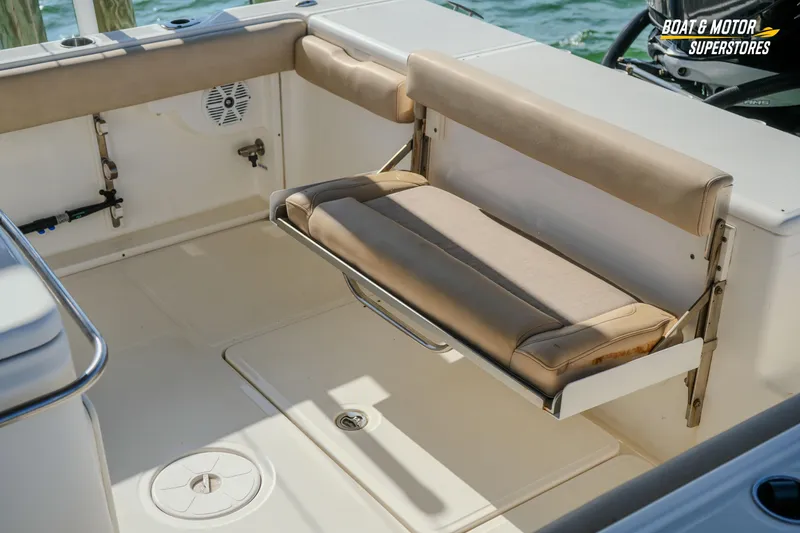 Slide: The Image of 2018 Key West Billistic 351 Center Console boat interior with foldable seating. - 85
