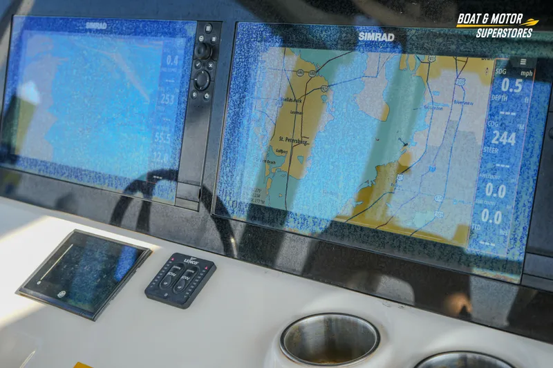 Slide: The Image of 2018 Key West Billistic 351 Center Console with Simrad navigation displays. - 99