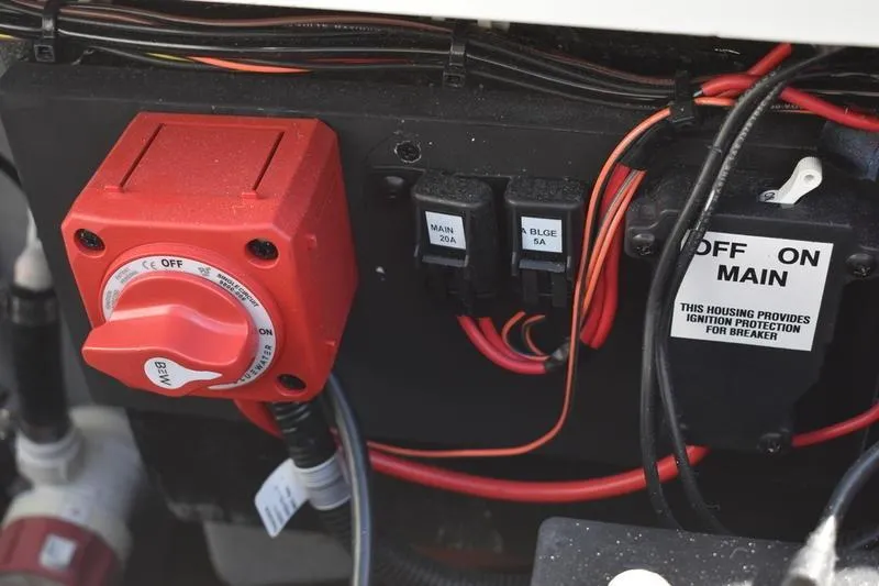 Slide: The Image of Electrical panel of 2026 Lowe Skorpion SS boat with switches and wiring. - 12