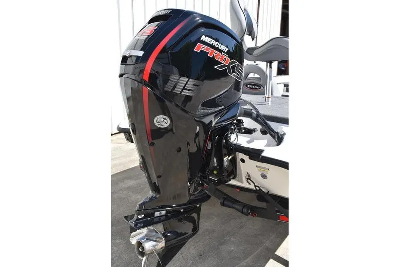 Slide: The Image of 2026 Lowe Skorpion SS with Mercury Pro XS outboard motor, side view. - 27