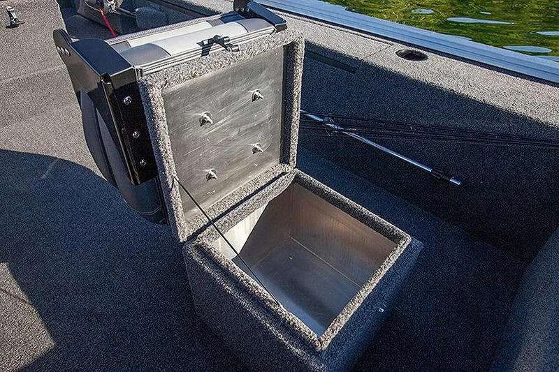 Slide: The Image of Open storage compartment in 2026 Lowe Skorpion SS boat interior. - 3