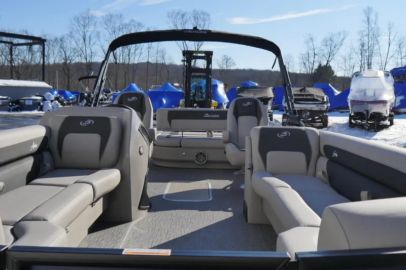 Slide: The Image of 2026 Barletta Aria 24UC pontoon boat with spacious seating and modern design. - 10