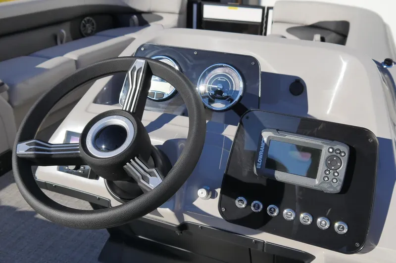 Slide: The Image of Steering console of 2026 Barletta Aria 24UC boat with navigation system. - 6