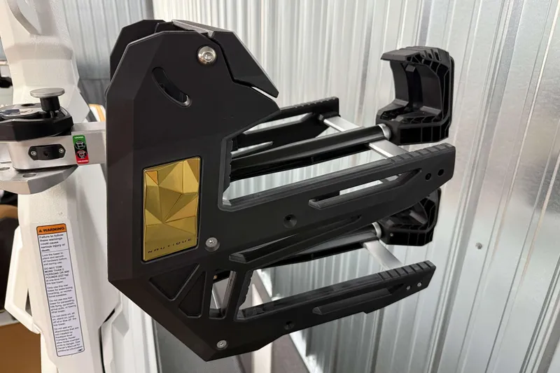 Slide: The Image of 2026 Nautique Super Air Nautique S23 wakeboard rack, featuring sleek black and gold design. - 35