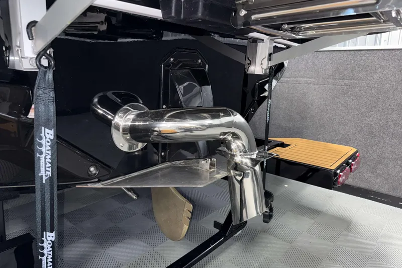 Slide: The Image of 2026 Nautique Super Air Nautique S23 boat exhaust and propeller detail. - 42