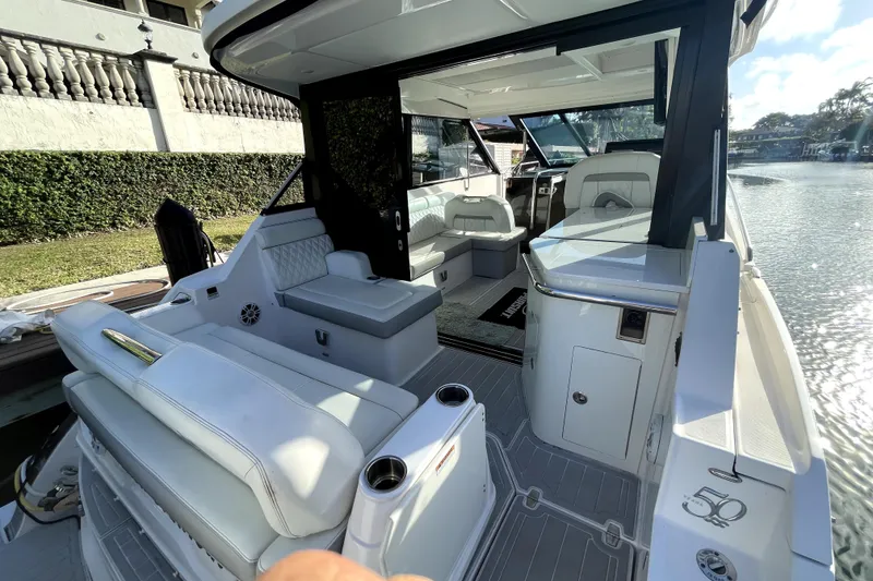 Slide: The Image of 2021 Regal 36 XO boat interior with luxurious seating and modern design. - 37