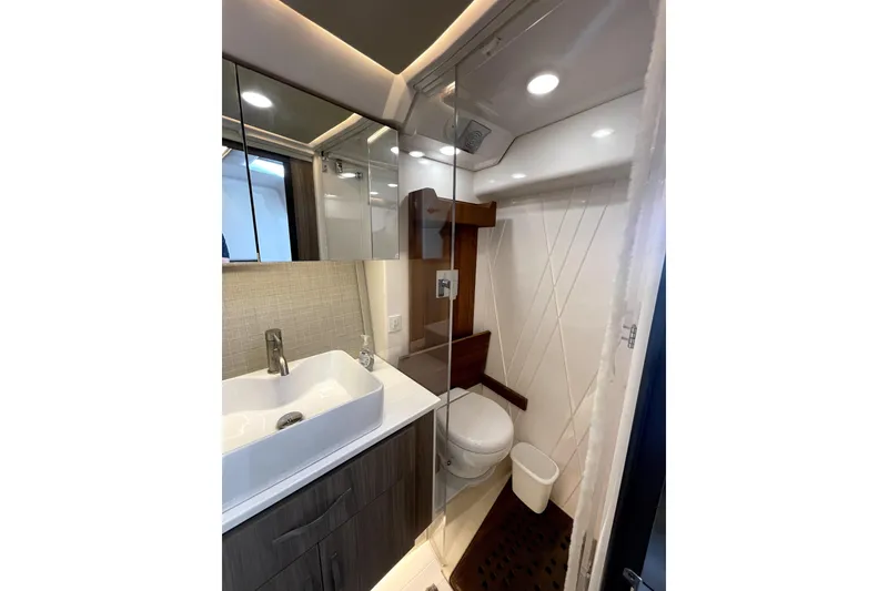 Slide: The Image of Luxurious bathroom in 2021 Regal 36 XO yacht with modern fixtures and elegant design. - 44