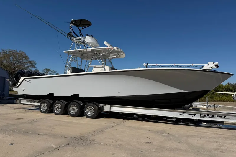 The Image of 2021 SeaVee 390Z boat on trailer, clear sky background. - 1