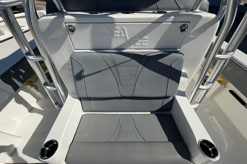Slide: The Image of 2021 SeaVee 390Z boat seat with gray upholstery and stainless steel accents. - 11