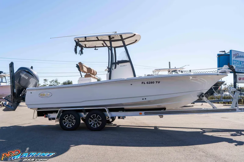 Slide: The Image of 2024 Sea Hunt BX 22 BR boat on trailer, side view, sunny day. - 12
