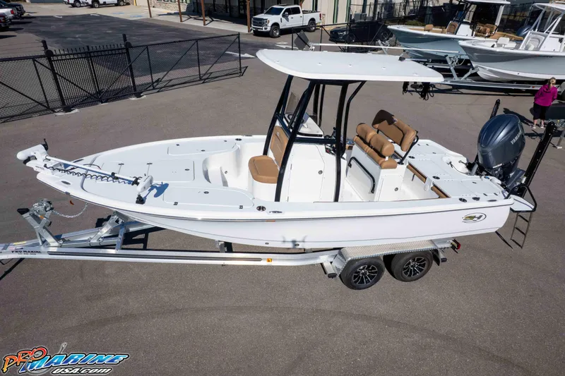 Slide: The Image of 2024 Sea Hunt BX 22 BR boat on trailer, displayed outdoors. - 31