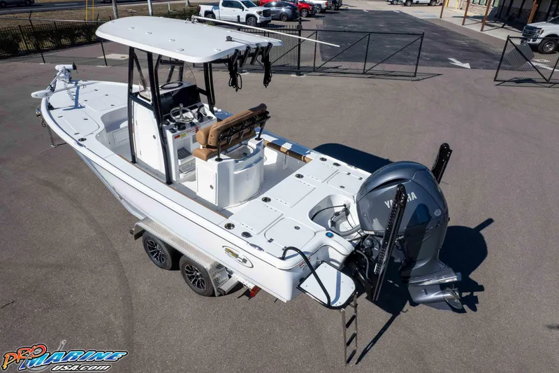 Slide: The Image of 2024 Sea Hunt BX 22 BR boat with Yamaha engine on trailer in parking lot. - 33