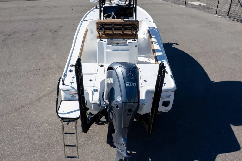 Slide: The Image of 2024 Sea Hunt BX 22 BR boat with Yamaha 200 engine, rear view. - 35