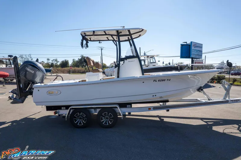 Slide: The Image of 2024 Sea Hunt BX 22 BR boat on trailer, displayed at dealership. - 39