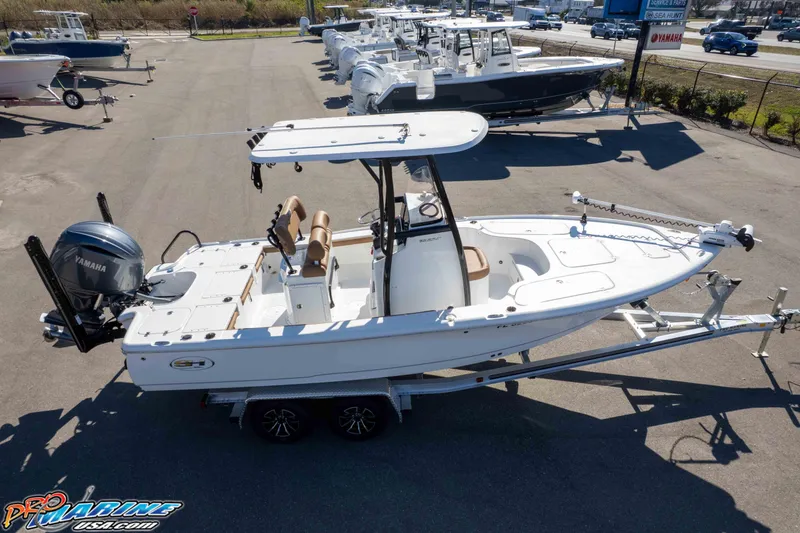 Slide: The Image of 2024 Sea Hunt BX 22 BR boat on trailer in dealership lot. - 41