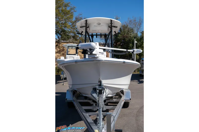 Slide: The Image of 2024 Sea Hunt BX 22 BR boat on trailer, front view, outdoors. - 5