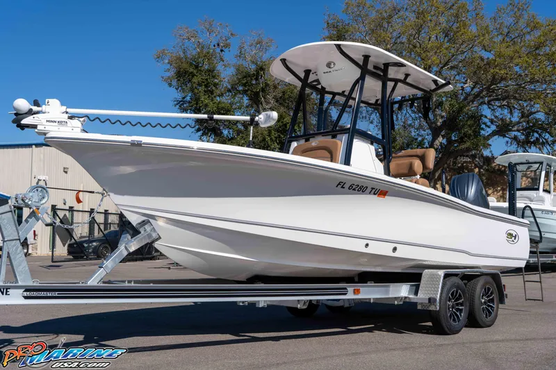 Slide: The Image of 2024 Sea Hunt BX 22 BR boat on trailer, featuring sleek design and modern equipment. - 6