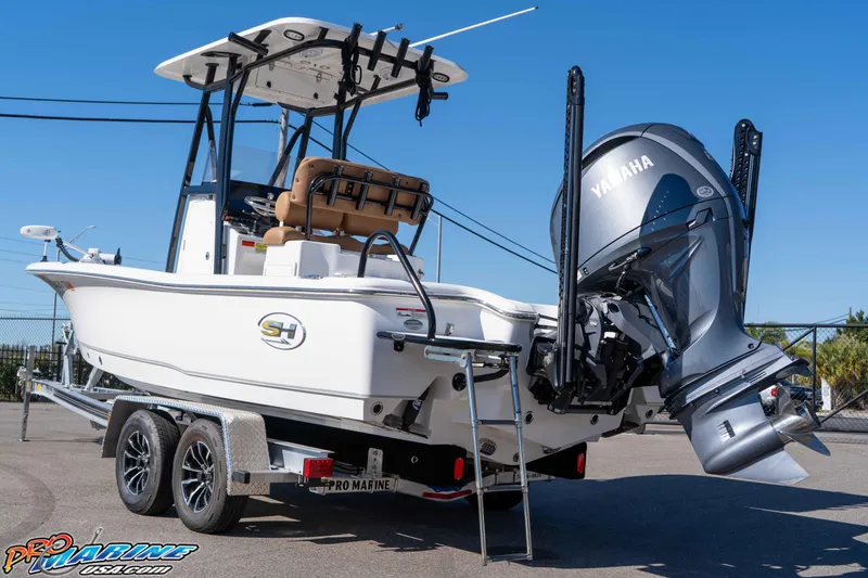 Slide: The Image of 2024 Sea Hunt BX 22 BR boat on trailer with Yamaha engine, outdoor display. - 9