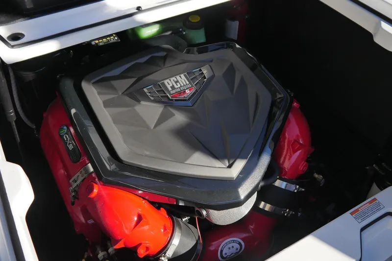 Slide: The Image of 2026 Nautique Super Air Nautique S23 engine compartment with PCM motor. - 13