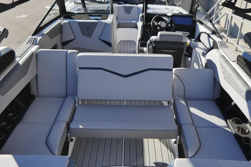 Slide: The Image of 2026 Nautique Super Air Nautique S23 interior with luxurious seating and modern design. - 5