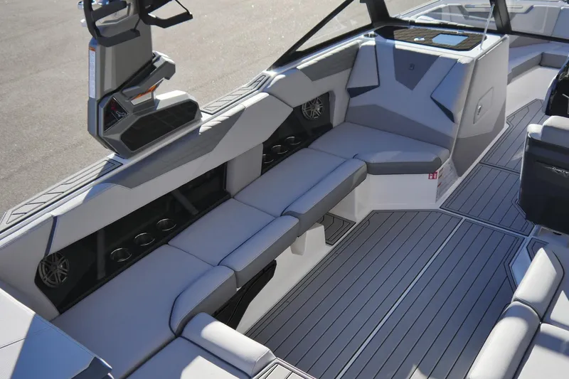 Slide: The Image of 2026 Nautique Super Air Nautique S23 interior with sleek seating and modern design. - 6