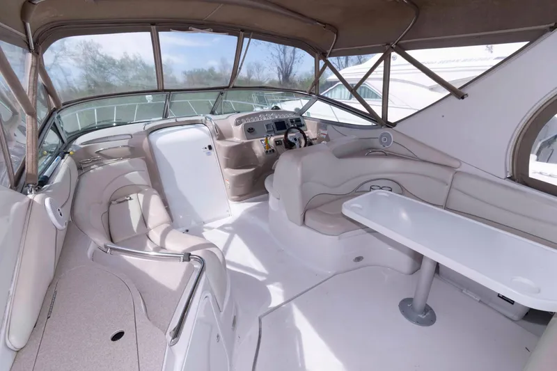 Slide: The Image of Interior of 2007 Larson Cabrio 370 boat with seating and helm station. - 3