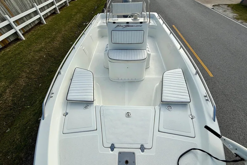 Slide: The Image of 2002 Bay Stealth 2030 boat with white seating and spacious deck. - 14