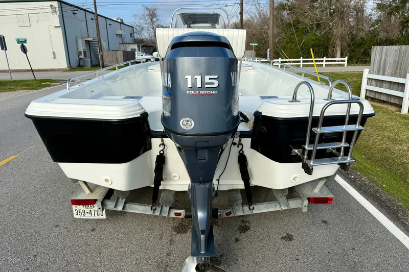 Slide: The Image of Bay Stealth 2030 boat, 2002 model, with Yamaha 115 four-stroke engine on trailer. - 3
