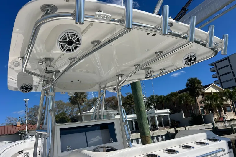 Slide: The Image of 2023 Contender 39 ST boat with sleek T-top and integrated speakers. - 12